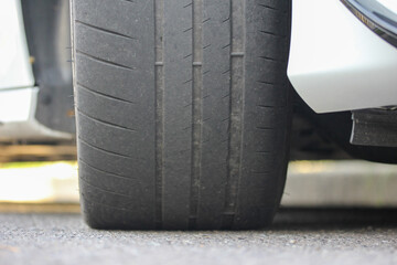 Close-up of a worn low-profile tire - obrazy, fototapety, plakaty