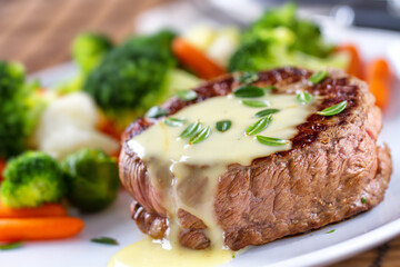 Fillet of beef with bearnaise sauce. High quality photo.