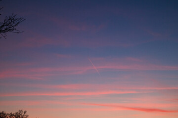 sunset sky with airplane