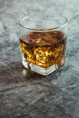 Whiskey glass marble background shiny