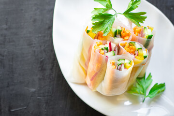 spring rolls Nem vegetables in rice paper organic dish on the table healthy food meal snack copy space food background rustic. top view keto or paleo diet veggie vegan or vegetarian food