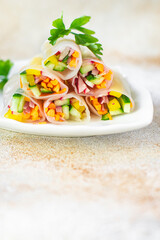 spring rolls Nem vegetables in rice paper organic dish on the table healthy food meal snack copy space food background rustic. top view keto or paleo diet veggie vegan or vegetarian food