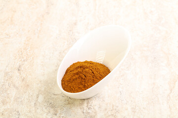 Dry Paprika powder in the bowl