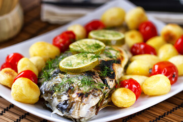 Baked Sea Bream with Baby Potatoes and Cherry Tomatoes