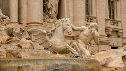 Rome. Detail of Trevi Fountain. A triton guide one of the two winged horses that pull Neptune's...