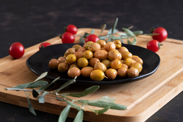 Green olive. Tasty green olives in the plate.