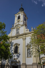Fototapeta na wymiar Church of the Merciful Brothers and the Monastery of the Merciful Brothers (17th century). Bratislava, Slovakia.
