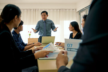 Asian manager boss angry in sales meeting seminar room for unsuccessful of target plan