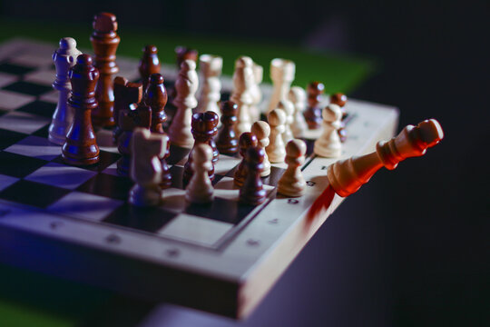 The overthrow of the king. Revolt and unification of whites and blacks against the king. Allegory in chess.