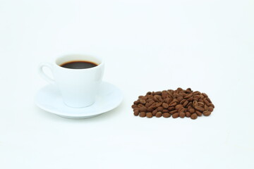 Coffee cup and beans on a white background.