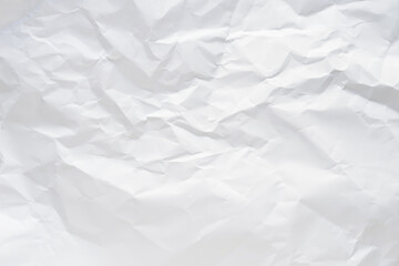 White crumpled paper texture background.