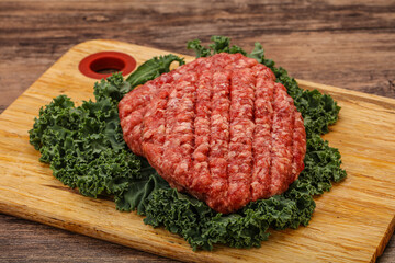 Raw beef burger cutlet for cooking