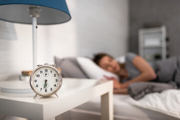 Alarm clock early in the morning. Time or waking up.