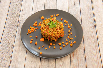 rice with vegetables with peas, parsley, peppers and carrots