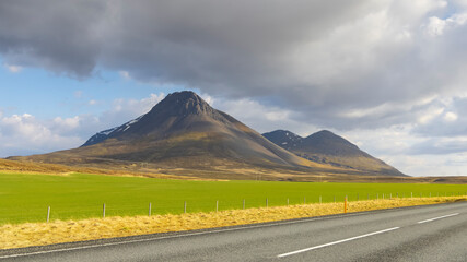 Tall mountains by Scenic ring road number one in Iceland