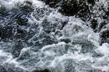 Areal view of water. Water background. Water foam.