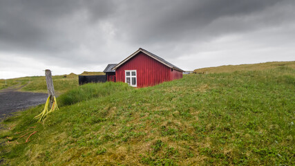 Fototapeta na wymiar Red farm house in rural Iceland