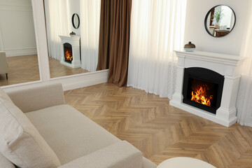 Modern living room with parquet flooring and fireplace