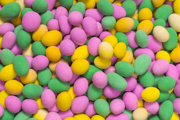 Group of colorful peanuts in glaze.