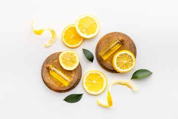Citrus essential oil vitamin c and lemon slices top view - obrazy, fototapety, plakaty
