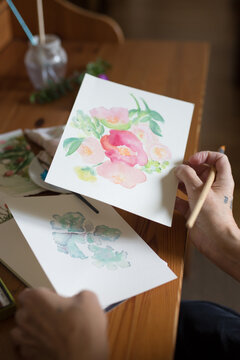 Senior woman drawing in your home