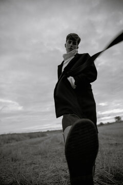 Young man running in the countryside.
