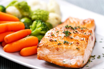 Salmon Fillet with Mixed Steamed Vegetables. High quality photo.