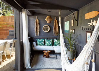 Tiki bar lounge area in backyard