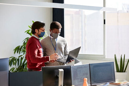 Big data analysts working - Powered by Adobe