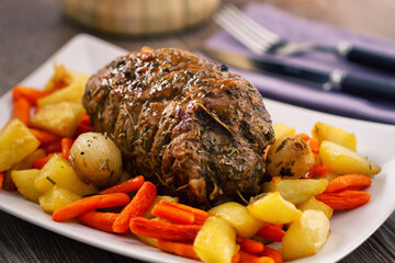Roast Beef with Potatoes and Carrots. High quality photo.