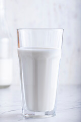 Delicious, nutritious milk is poured into a glass.