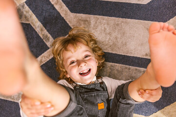 Cheerful kid having fun and laughing