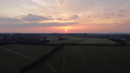Sunset over countryside.