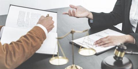 Lawyer discuss the contract and legal document agreement in office. Law and legal concept