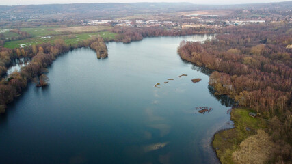 Aerial view of countryside and lake.