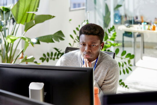 Black businessman working on computer