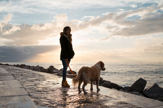 Woman walking out with her dog