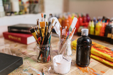 Close-up of brushes and art supplies