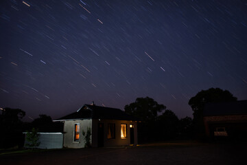 cottage with sky trails