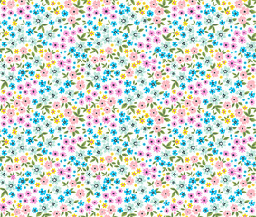 Fototapeta premium Ditsies floral pattern. Ditsy background of small colorful flowers. Small-scale flowers scattered over a white background. Stock vector for printing on surfaces and web design.