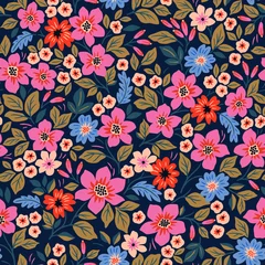 Möbelaufkleber Folk seamless vector floral pattern. Endless print made of small colorful flowers. Summer and spring motifs. Blue background. Stock vector illustration. © ann_and_pen