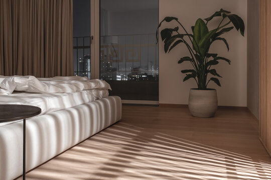 Interior Of Illuminated Modern Bedroom With Light Walls