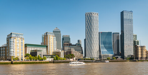 View of the Docklands Skyscrapers from the river Thames looking East, London, UK