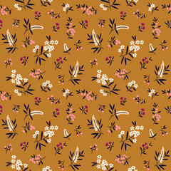 Seamless floral pattern. Ditsy background of small pink and white flowers. Small-scale flowers scattered over a gold yellow background. Stock vector for printing on surfaces and web design.