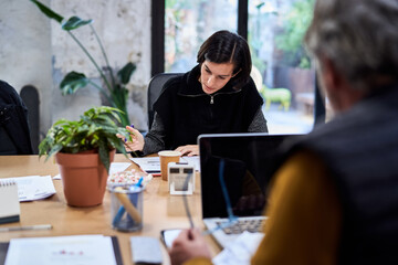 Businesswoman highlighting text