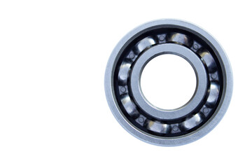 Ball bearing with steel cage close-up on a white background. The bearing is located on the right. Isolated. Copy space.