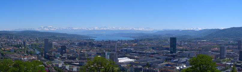 Panorama view over the City of Zurich with lake Zurich and Swiss alps in the background at a beautiful summer day. Photo taken June 14th, 2021, Zurich, Switzerland.