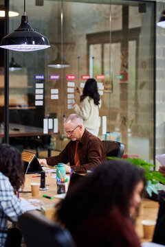 Company analyst working with documents