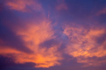Orange sunset clouds, evening sky
