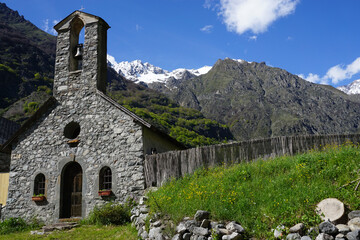 old stone small church in the mountains of the Alps, France
